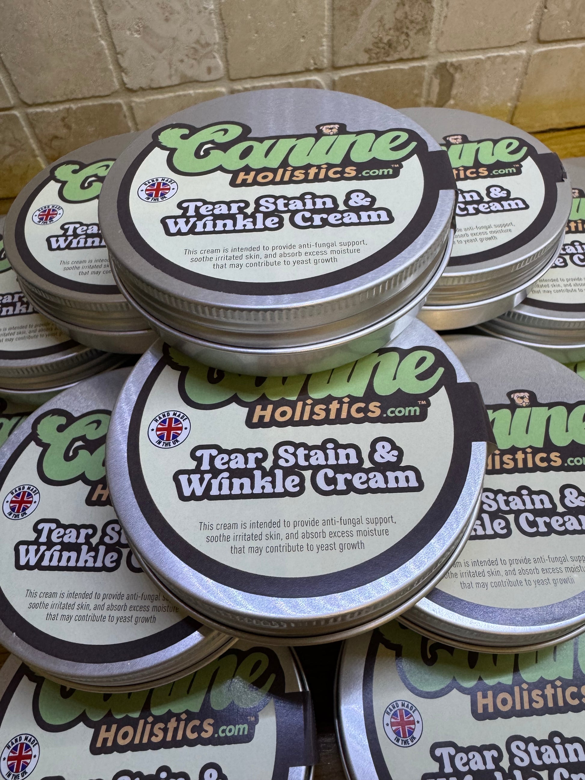 Canine Holistics™ Tear Stain & Wrinkle Cream for Dogs – 100ml eco friendly aluminium tin, top wide view stack of multiple tins. 