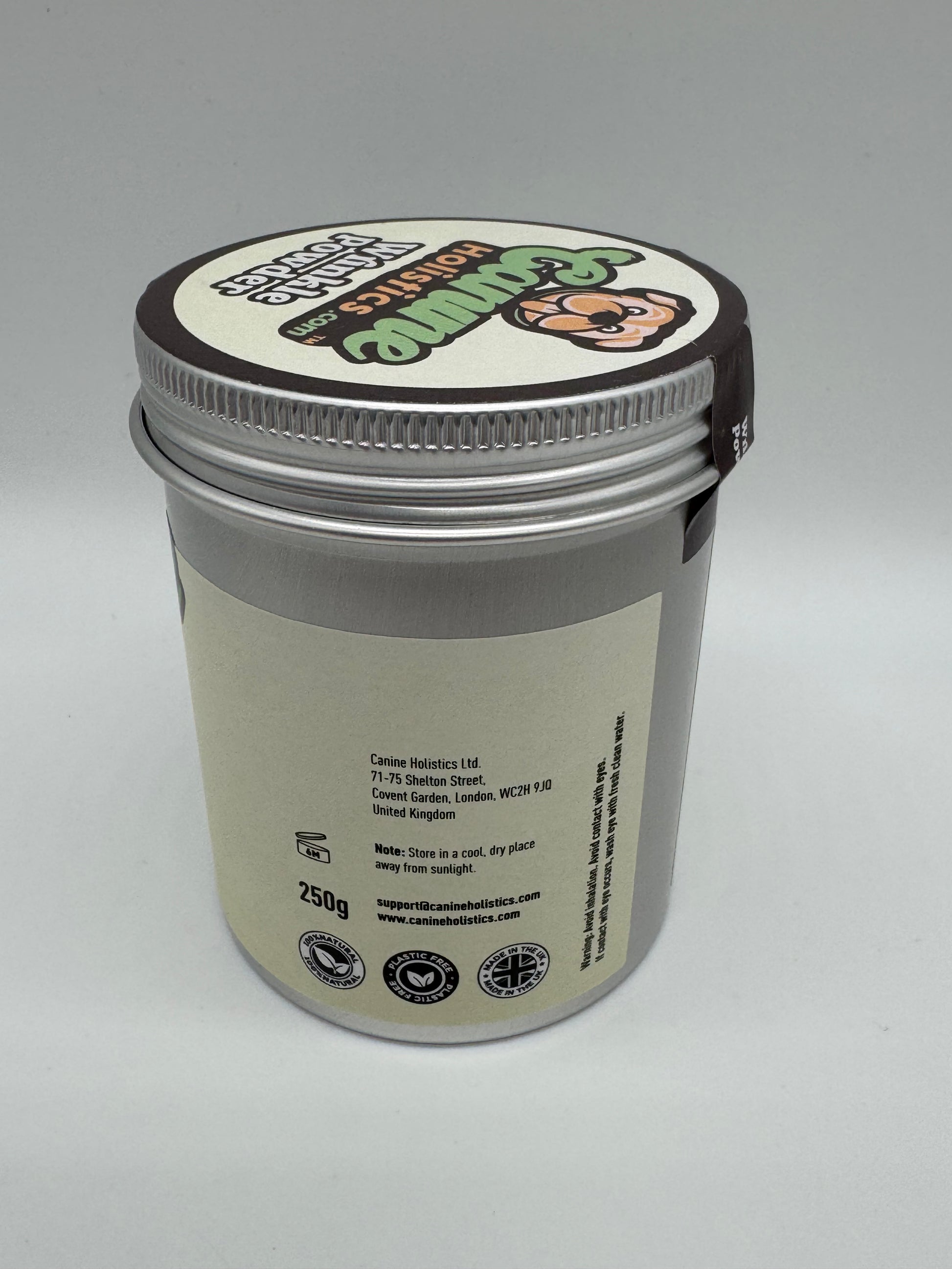 Image containing Canine Holistics™ Wrinkle Powder 250g. Right side view of branded product in aluminium packaging tin, displaying company information and logos. 