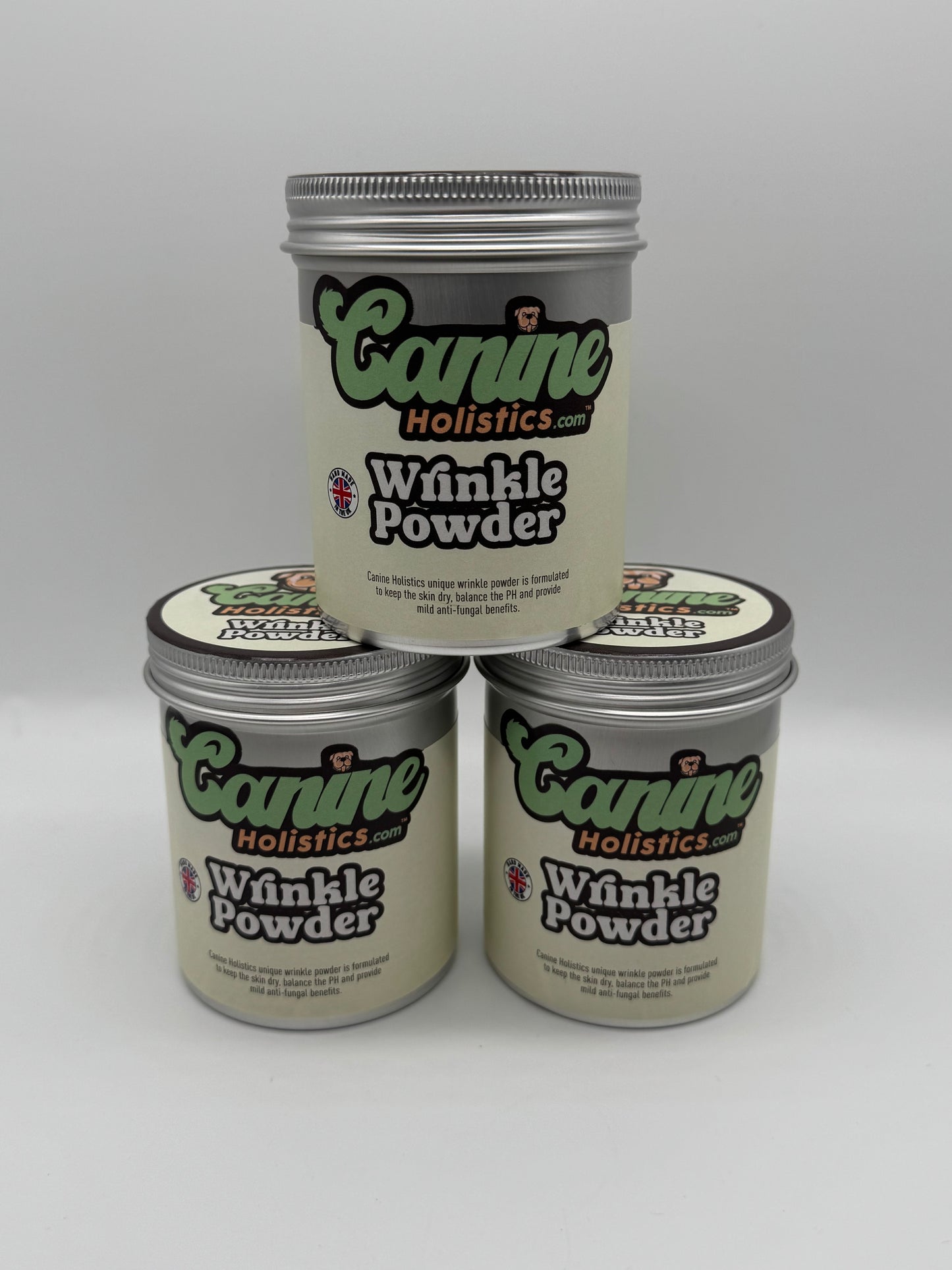 Image containing stack of 3 x Canine Holistics™ Wrinkle Powder 250g. Front view of branded products in aluminium packaging tins stacked on top of each other. 